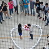 chinese man proposed his girlfriend by stacking 99 iphone 6 form heart ahead singles day she 300